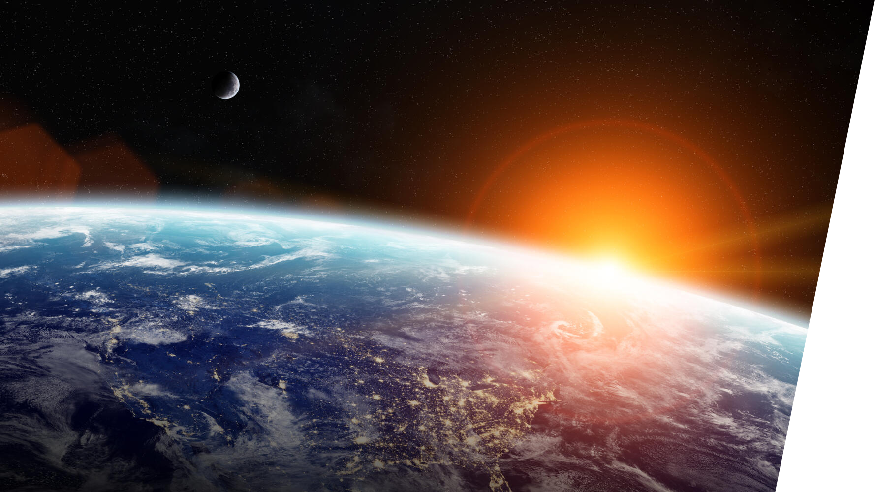View from space of Earth with a glowing sunrise on the horizon, illuminating clouds and city lights. A distant moon is visible against a starry sky.
